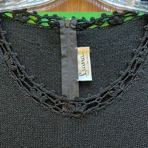 LIANA is mfg’er of dress. Heavy Knit; classic.